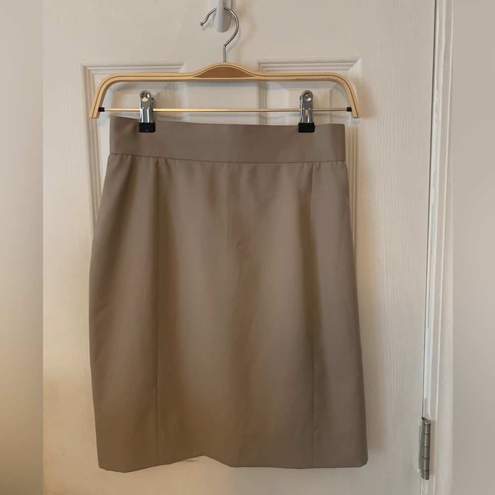 Chanel beige vintage classic mini skirt, 26” with size tag cut out.